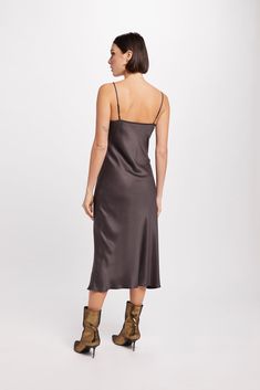 Cut on the bias for a figure-flattering drape that hugs your curves, this strappy slip dress is made in our luxuriously soft, lightweight and eco-friendly TENCEL™. Layer it over a turtleneck while it's still cold, then wear it with sandals and a jean jacket once the weather warms up. Bias Slip Dress, French Seam, Hug You, Mulch, Fabric Color, Jean Jacket, Design Details, Slip Dress, Turtle Neck