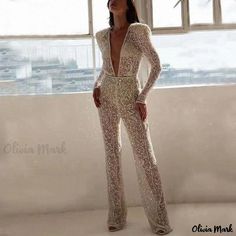 Olivia Mark - Stylish and Sensual Long Sleeve Jumpsuit with Golden Sheen Fitted White V-neck Jumpsuits And Rompers, White Stretch Bodysuit For Evening, White Fitted Jumpsuits And Rompers For Spring, Glamorous White Long Sleeve Jumpsuits And Rompers, White Evening Bodysuit For Summer, White Summer Evening Bodysuit, Glamorous Spring Wedding Jumpsuit Or Romper, White Fitted V-neck Bodysuit, Fitted White V-neck Bodysuit