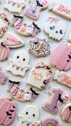 some decorated cookies are laying on a table