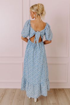 - Keep thriving and vibing this season with this cute dress! - Fully lined material with a petite floral print - A v-cut neckline with a ruched detail - Short puff sleeves with elastic shoulder and elastic cuffs - A back cutout and tie detail - A waistline with an elastic back - A flowy yet flattering silhouette that ends in a midi length hemline Measurements S : Bust 32", Hip 36", Length 44.5", Sleeve Length 11", Waist 26". M : Bust 34", Hip 38", Length 45", Sleeve Length 11.5", Waist 28". L : V Cut, V Cuts, Cute Dress, Platform Heels, Puff Sleeves, Midi Length, Cute Dresses, Puff Sleeve, Blossom