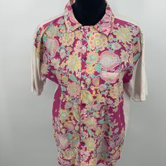 Lovely New With Tag Vintage Fiorucci Shirt. Has Price Tag - Never Worn! Beautiful Pink Floral Pattern With White Sleeves And Back. 20 In Across Top Chest. Medium Or Large Size Shirt Size Tag Not Included On Garment. Excellent Condition. About A 16 In Neck. Casual Pink Shirt With Casual Collar, Pink Cotton Shirt With Placket, Casual Multicolor Shirt With Spread Collar, Pink Cotton Button-up Short Sleeve Shirt, Pink Short Sleeve Tops With Placket, Multicolor Collared Tops With Placket, Casual Multicolor Tops With Spread Collar, Casual Collar Top With Floral Print, Pink Collared Short Sleeve Shirt With Relaxed Fit