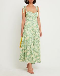 Price Comparison Few Moda $79 Alice + Olivia $268 Zimmermann $318 Product Details The bustier style bodice of this gorgeous gown is finished with pretty tie straps. Done in a romantic floral print.- Back zipper- Adjustable straps- Lined- Content: 100% Polyester Style# T22WDR12443 Fit Notes - Model wearing a size 6- Shoulder seam to hem measures approx 52'' in length - Model measurements: Height: 5'10"" Bust: 36"" Waist: 26"" Hips: 36"" Size Length Bust Waist Hips 0 111 70 - 73 61 118 2 113 72 - Floral Dress Green, Green And White Floral Dress, Sage Floral Dress, Green Floral Bridesmaid Dresses, Sage Green Floral Dress, Moh Dress, Wedding Guest Suits, Mismatched Dresses, Bm Dresses