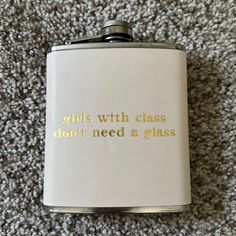 a flask with the words girls with class don't need a glass on it