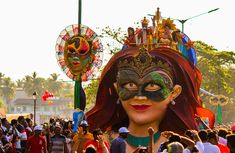 a group of people standing around each other with masks on their faces and in front of them