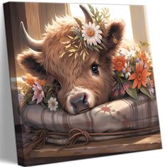 a painting of a cow with flowers on it's head resting on a pillow