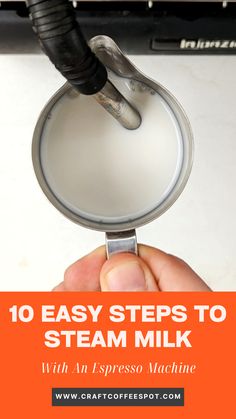 a hand holding an object with the words 10 easy steps to steam milk on it