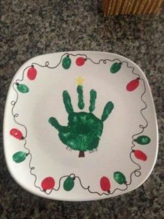 a plate with a hand print on it