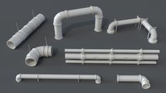 several different types of pipes and fittings on a gray background with space for text