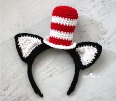 a crocheted cat in the hat headband with ears