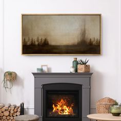 a living room with a fire place in the center and a painting on the wall