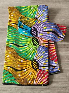 DESCRIPTION African Ankara Fabric. This is high quality African print is 100% cotton and it's 45 inches wide. It is used for making African Clothing, African quilts, & For Home decoration. FYI: Print is Double sided. The listing is for 3yards and 6yards Each piece of fabric measures: 105 - 108in by 45in for 3yards 210 - 216in by 45in for 6yards If you purchase more than one yard, you will receive one continuous piece. *If you require more than what I have listed, feel free to send me email. CARE Cotton Fabric With Multicolor Batik Print, Cotton Batik Print Multicolor Fabric, Traditional Multicolor Cotton Fabric With Batik Print, Multicolor Batik Print Fabric Patterns, Multicolor Batik Print Fabric And Notions, Colorful Multicolor Ankara Fabric With Pattern, Multicolor Cotton Batik Print Patterns, Multicolor Cotton Fabric With Vibrant Print, Cotton Fabric With Vibrant Multicolor Print