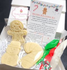 a box filled with cookies and candy on top of a table