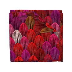 a red and purple pattern with wavy shapes