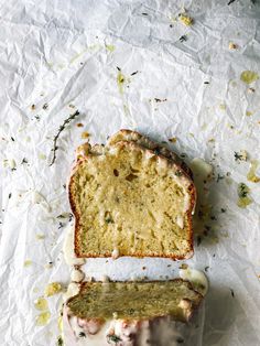 two slices of cake sitting on top of white paper