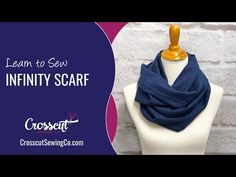 a mannequin wearing a blue scarf with the words learn to sew infinity scarf