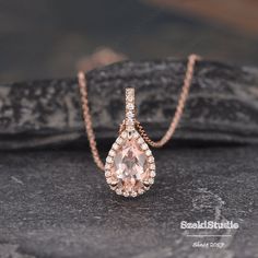 "Pear Shaped Morganite Necklace Natural Morganite Jewelry Set 3pcs Pear Morganite Earrings Halo Rose Gold Jewelry Wedding Jewelry Set Women ITEM INFORMATION Metal: solid 14k rose gold, yellow gold, white gold  Center Stone - 6x9mm pear natural morganite  Side Stones: Moissanite, Round CUT Weight: 0.1ct **Stone Replacement** Available with any other gemstones, please feel free to contact me for a quote. **Metal Type** Available in 14K or 18K yellow gold, white gold, and rose gold. Please select from the drop-down menu. **Production Time& Rush Order** Our standard production time is 3-4 weeks from the time of purchase. I am happy to provide rush order service, the price is $60, and the Process time would be 10-15 business days instead of 3-4 weeks. Here are the links below: https://www.etsy. Wedding Pear-shaped Gemstone Necklace, Pink Teardrop Pendant Jewelry For Wedding, Rose Gold Pear-shaped Jewelry With Prong Setting, Pear-shaped Rose Gold Jewelry For Anniversary, Rose Gold Pear-shaped Necklace For Wedding, Gold Jewelry Wedding, Morganite Necklace, Morganite Jewelry, Morganite Earrings