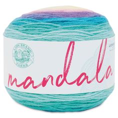 yarn ball with the word mandala written in pink and blue on top of it