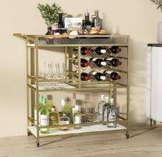 a bar cart filled with bottles and glasses