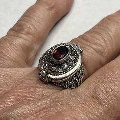 This Elegant Poison Ring Is Made Of High-Quality Sterling Silver And Features A Beautiful Garnet Stone. The Ring Is A Size 9 And Has A Unique Pillbox Style. It Is Perfect For Those Who Want A Stylish And Functional Accessory. The Ring Does Not Have Any Diamonds Or Other Gemstones, Making It A Great Choice For Those Who Prefer A Simple And Classic Design. The Metal Purity Is 925 And The Base Metal Is Also Silver. This Ring Is A Great Addition To Any Jewelry Collection And Is Sure To Impress. Vintage Poison Ring, Victorian Widow, Maximalist Rings, Emo Oc, Pirate Bar, Victoria Era, Season Outfits, Garnet Color, Poison Ring