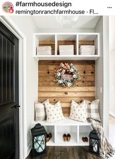 the entryway is decorated with white and wood