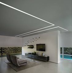 a modern living room with white walls and flooring