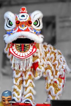 a statue of a lion on top of a table