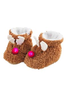 a pair of brown baby shoes with white bows and pink balls on them, all in the shape of reindeer's head