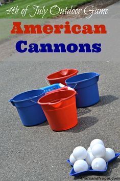 three buckets filled with white and red balls sitting on the ground