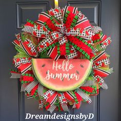 a watermelon wreath with the words hello summer on it