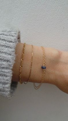 Before placing an order please check the estimated shipping times. If you need your order in a hurry shipping upgrades are available. Thank you. This little bracelet made with high quality materials makes a great gift. D E T A I L S *It features an AAA quality kyanite crystal that has been beautifully cut to make it extremely sparkly. *It is attached to delicate 14k gold filled chain that has been doubled over. *Gold filled is a wonderful alternative to solid gold and unlike gold plating does no Dainty 14k Gold Gemstone Chain Bracelet, Minimalist Blue Bracelet With Delicate Chain, Everyday Blue 14k Gold Filled Bracelets, Delicate Blue Bracelets For Everyday, Elegant Blue Chain Bracelet For Everyday, Blue 14k Gold Everyday Bracelets, Blue Minimalist 14k Gold Filled Bracelets, Everyday Blue 14k Gold Bracelets, Dainty Gemstone 14k Gold Filled Bracelets