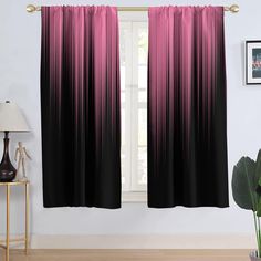 black and pink curtains hanging in front of a window with a plant next to it