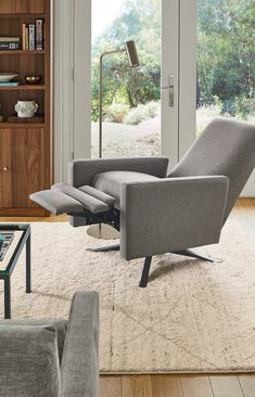 a living room scene with focus on the reclining chair