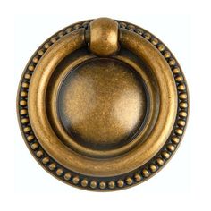 an antique brass door knob on a white background