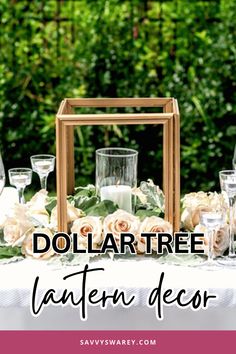 a table with flowers and candles on it that says dollar tree lantern decor over the top