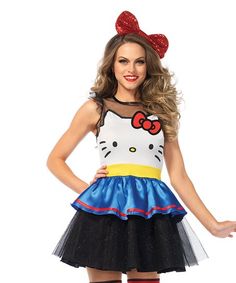 a woman wearing a hello kitty costume