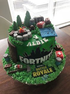 a birthday cake made to look like a fortnify battle royale