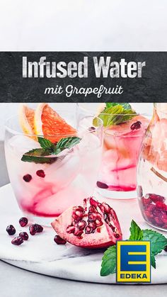 three glasses filled with different types of drinks on top of a white plate and the words infused water mit grapefruit