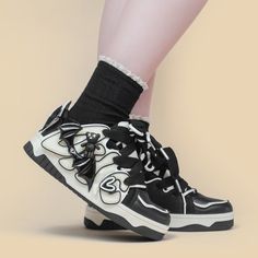 Step Out with a Touch of Dark Elegance in our Demon Bear Wings Chunky Sneakers! 😈🐻👟 🌟 Charming and Mysterious: These chunky sneakers are perfect for adding a playful touch of demon bear charm to your style. Ideal for those who appreciate a blend of mischief and elegance. ✨ Superior Quality: Crafted with precision to ensure top-notch quality. Designed for a comfortable fit and featuring a demon bear design with wings that exude an air of mystery. 💫 Versatile and Stylish: These sneakers eleva Black Harajuku Style Lace-up Sneakers, Harajuku Style Black Sneakers With Round Toe, Black Low-top Harajuku Skate Shoes, Black Harajuku Low-top Skate Shoes, Harajuku Style Black Low-top Skate Shoes, Halloween All Year, The Occult, Halloween Lovers, Wings Design