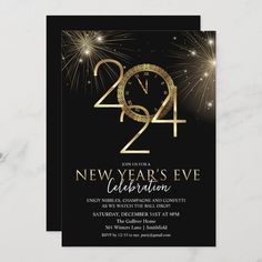 a black and gold new year's eve celebration card with fireworks in the background