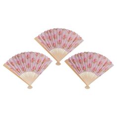 three pink hand fans with flowers on them