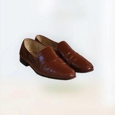 Men Vintage Leather Brown Loafers By Paolini size 9. Loafers have a classic round toe, leather sole with tons of life left in them. Pair with slacks or jeans on those relaxed Fridyas at the office.  **Some wear on the soles but otherwise in GOOD VINTAGE CONDITION** SEE PICS AND VIDEO THROUGHLY!! Length: 11 " Width:3 1/2 " Heel: 1/2" Color: Brown" Condition:Good Vintage  Brand: Paolini Mens Loafers, Brown Loafers, Men Vintage, Vintage Branding, Houston Tx, Slip Ons, Vintage Leather, Loafer Shoes, Loafers Men