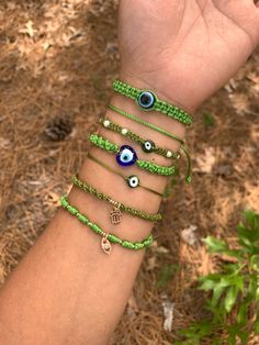 Minimalist olive green and green bracelets 😍 Materials: resin eye, nylon #2 and nylon #18, 18k gold plated beads, 14k gold plated hamsa hand/evil eye, glass pearls, glass flat evil eye and glass heart evil eye.  All bracelets are size 6 inches - 10' when fully open.  💕 Most of my bracelets are 1/2 cm wide(thick) some are 1 cm. 💕 Sliding knot closure and completely adjustable. Message me with any questions or different sizing prior to purchase 💕.  Remember that handmade pieces are always unique and they never look exactly the same 🤩 that's why they are so special 😍😉. ️🎁 Follow  me on Instagram  and Facebook for giveaways, special offers and discounts   @roxysshop2021 🧿💎Jewelry Care💎🧿 If your bracelet is made of gold/silver plated beads or any metal beads and charms please follow Adjustable Resizable Green Jewelry, Adjustable Beaded Green Evil Eye Bracelet, Green Spiritual Jewelry With Evil Eye, Spiritual Green Jewelry With Evil Eye, Green Beaded Bracelets With Sliding Knot As Gift, Green Beaded Evil Eye Bracelet Gift, Adjustable Green Evil Eye Spiritual Bracelet, Green Spiritual Jewelry With Adjustable Cord, Green Adjustable Spiritual Evil Eye Bracelet