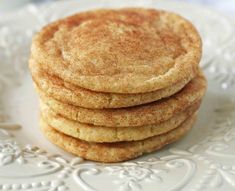 a stack of cookies sitting on top of a white plate