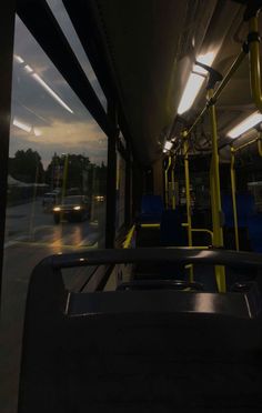 the inside of a bus with its lights on