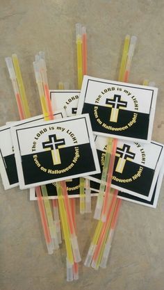 four stickers with cross on them sitting next to each other