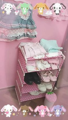 a pink closet filled with lots of baby clothes