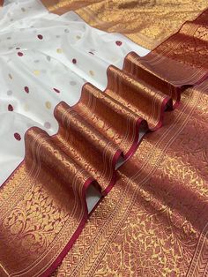 It's a beautiful Original chanderi handloom pure katan silk saree . All over minakari teeli work jaal handmade nakshi border including running plane blouse. Saree length: 6.40m, width: 46in  [ saree 5.50m, blouse 90cm ] Dry clean only . Please note - color may be vary a little due to sunlight and photography . Please message us after purchasing in case you want fall and Pico done it not . No extra charges for fall and Pico but inform us . Blouse stitching is also available . White Katan Silk Saree With Zari Weaving, White Banarasi Silk Dupatta With Border, White Art Silk Dupatta With Border, White Silk Dupatta With Border, Elegant White Paithani Silk Saree, White Paithani Silk Handloom Dupatta, Elegant White Paithani Silk Dupatta, Elegant Paithani Silk Saree With Border, Wedding Saree Silk