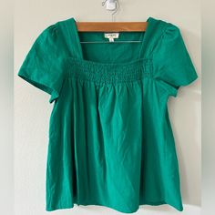 Umgee Peasant Blouse In Seagreen With Capped Sleeves In Very Good Condition And Never Worn. 100% Cotton Green Short Sleeve Blouse For Day Out, Green Cotton Square Neck Top, Green Square Neck Cotton Top, Spring Peasant Top With Square Neck, Peasant Style Square Neck Blouse For Spring, Green Square Neck Top For Summer, Green Peasant Blouse For Summer, Green Cotton Blouse For Spring, Green Blouse For Spring Day Out