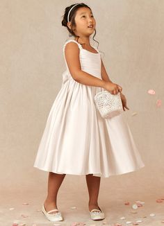 Let your flower girl have fun walking down the aisle while tossing petals in our Matte Satin A-line dress, Cutie Pie. Her square neckline is ruched beautifully and has elastic straps. The back ties into a beautiful bow while the gathered skrit is perfect for twirling an dancing. Flower Girl Dresses Off White, Wedding Flower Girls Dresses, Formal Flower Girl Dresses, Classy Flower Girl Dress, Older Flower Girl Dresses, Vintage Flower Girl Dresses, Flowergirl Dress, Tea Length Flower Girl Dress