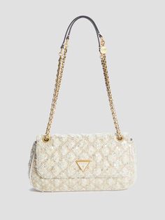 Quilted sequin tweed crossbody bag Antique gold-tone hardware Enamel signature triangle emblem Multiple interior pockets Cotton-blend lining Fold-over flap with magnetic snap closure Chain and faux-leather shoulder strap with 12.5" drop. Chain and faux-leather crossbody strap with 22" drop. 11.75"W x 6"H x 2"D Crossbody Guess, Gold Crossbody Bag, Gold Shoulder Bag, Guess Bag, Gift Inspo, Gold Bag, Guess Bags, Guess Handbags, Convertible Bags